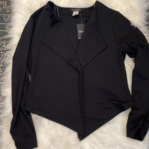 Black high low tuxedo style jacket.